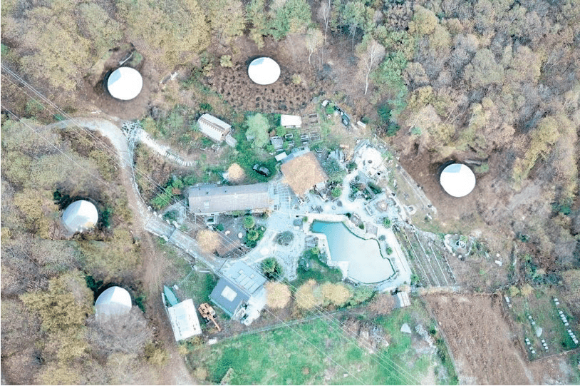 Aerial view of Rustico Genua property with glamping domes